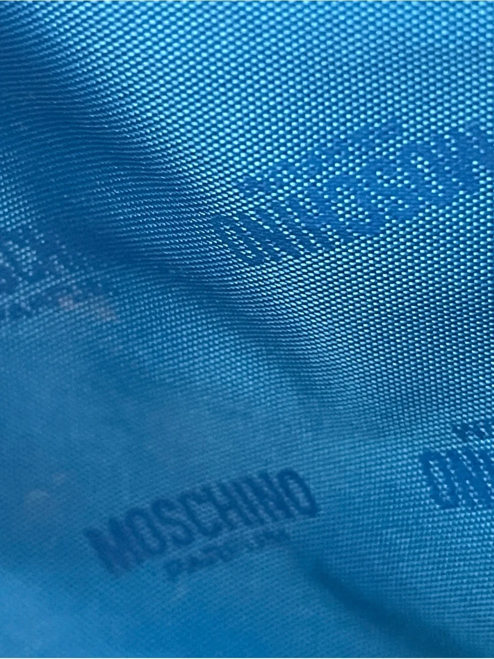 Moschino Bright Blue Cosmetic Pouch with Red Trim and 'Fresh' Charms